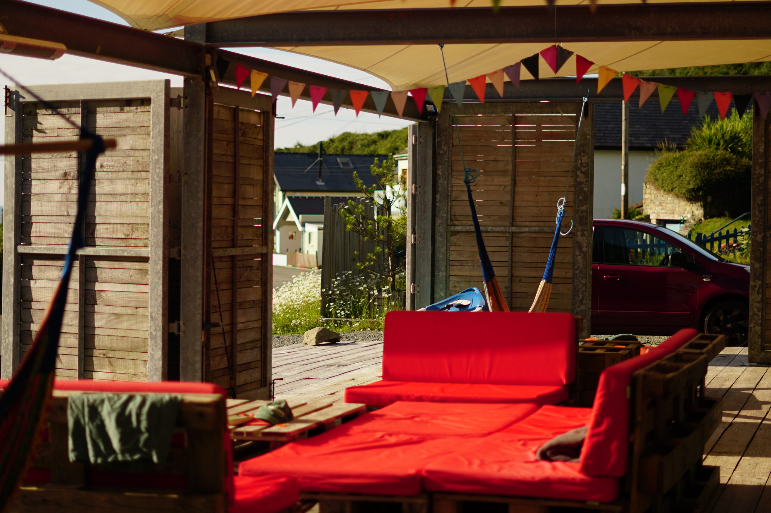 The doors on the deck open to reveal the view to the beach